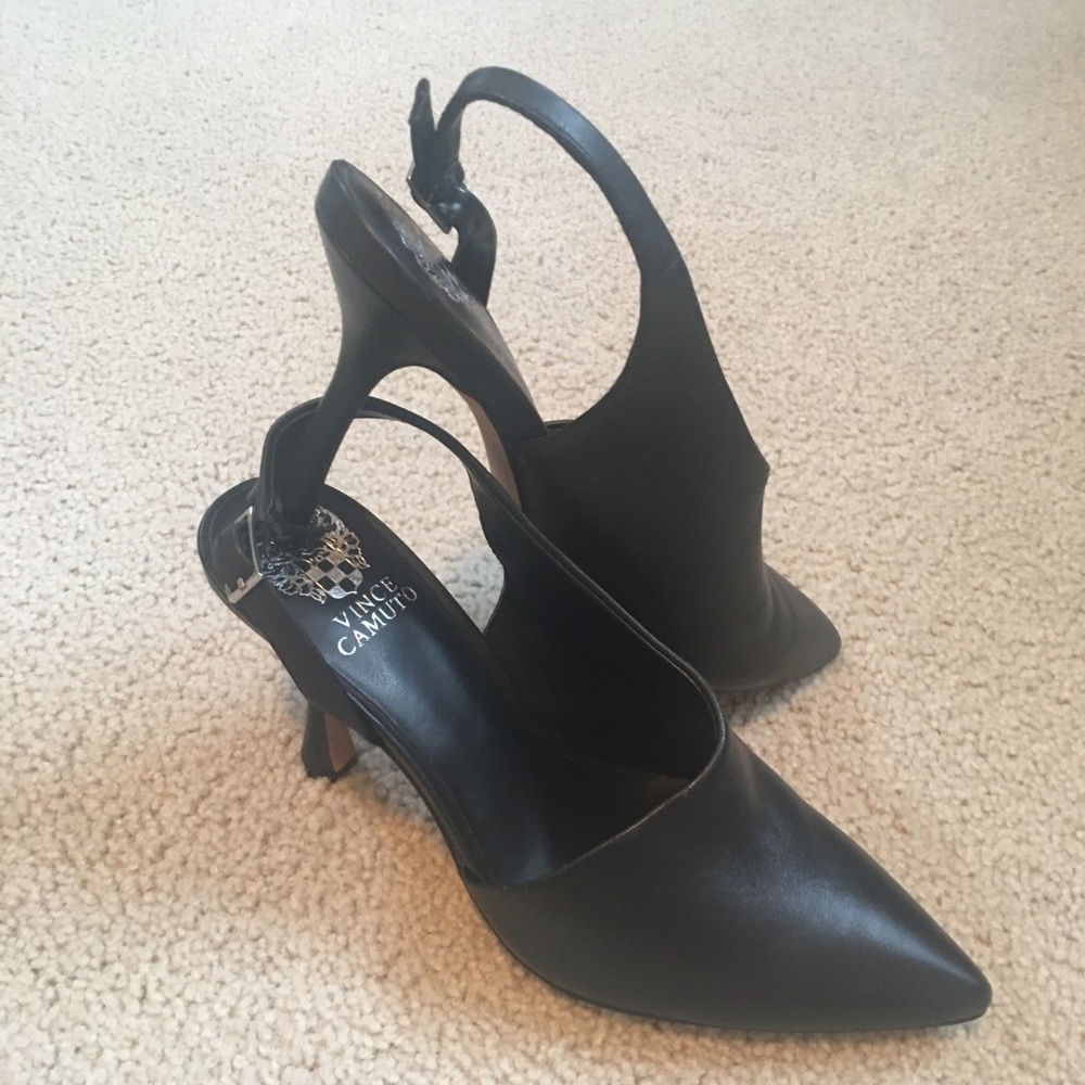 Vince Camuto black heels . Never worn . Sz 7